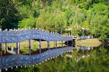 lake in tropical area at afternoon reflex water with pavilion in Thailand