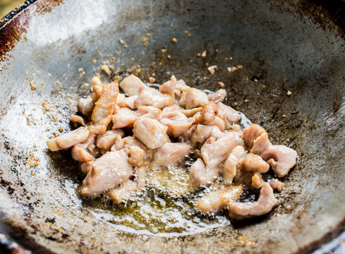 frying pork in pan