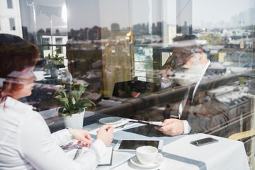 business people talking in restaurant