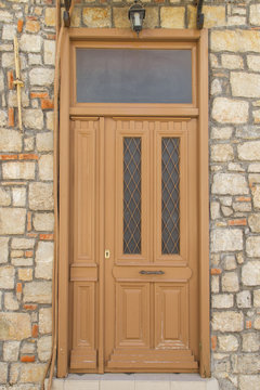 Vintage wooden door in village of Greece
