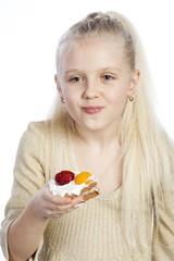 Girl eats a cake