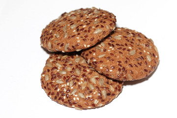 cookies with sesame seeds and wholegrain on white