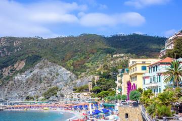 Daylight view to Monterosso al Mare mountains and city streets with buildings. Italy, Cinque Terre