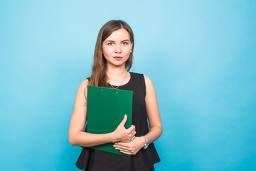 Business Woman Holding A Clip Board on blue background and copy space.