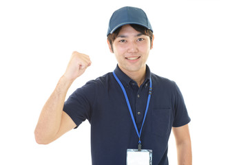 ガッツポーズの男性作業員