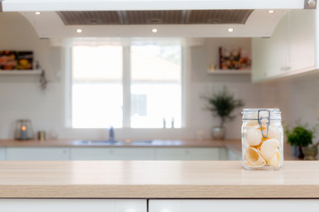 kitchen banner with countertop with a glass jar with pasta ktichen unfocuesd in the background