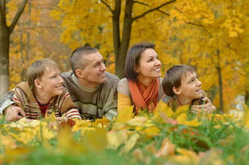 Fototapeta premium family in autumn forest