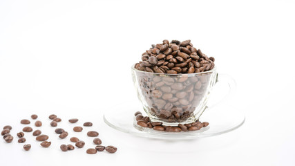 coffee beans in a cup on a white background.