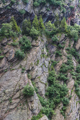 View of the high cliff at rocky Fagaras mountains in Carpathians, Romania