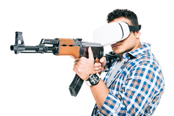 man in virtual reality headset with rifle