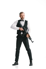secret agent in suit with rifle
