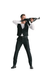 Fototapeta na wymiar secret agent in suit with rifle