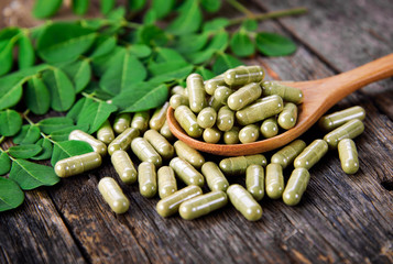 Moringa leaves and capsules (Herbs for health)