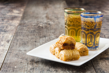 Turkish dessert baklava on wooden table
