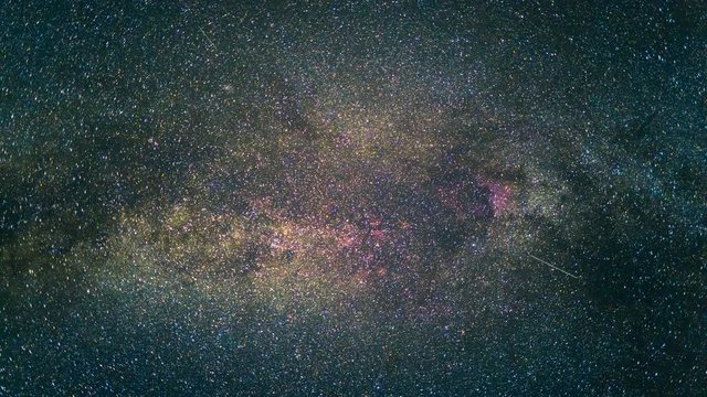 The picturesque view in the sky against the meteor shower. no clouds, time lapse