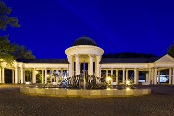 Colonnade of mineral water springs Caroline, Rudolf at evening - center of Marianske Lazne...