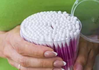 Box of cotton buds. Selective focus, cropped image.