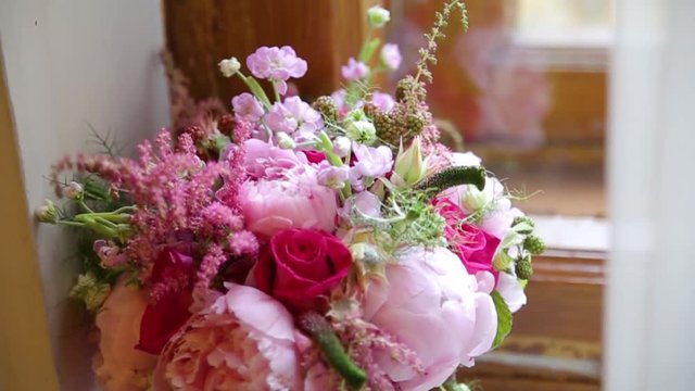 beautiful bouquet of flowers on window sill. beautiful bouquet of pink and white flowers are on the windowsill