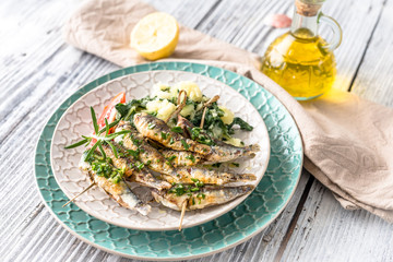 Healthy sardines with potato and chard