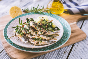 Healthy sardines with potato and chard