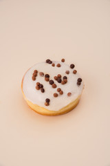 White donut with flakes isolated