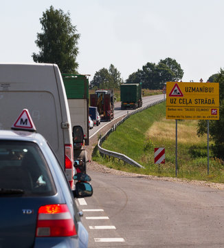 Road works on the shosse with car.