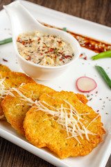 Potato pancake with sauce