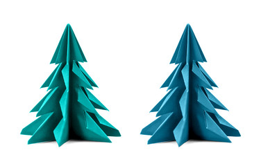 Origami Christmas tree paper isolated on white background. For decoration, Merry Christmas or Happy New Year postcard. Turquoise and blue color. Front view. Close up.