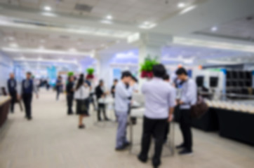 Blurred people walking in the hall.concept for blur background .