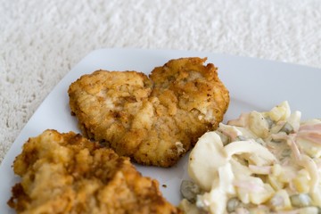 Heart  - shaped schnitzel with salad. Slovakia