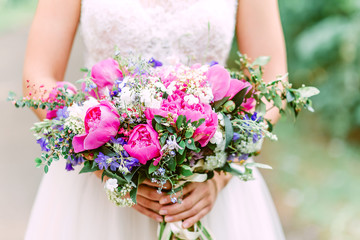 Obraz na płótnie Canvas wedding bouquet of peony, lupines