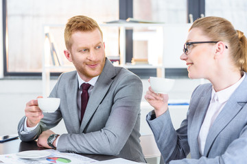 businesspeople drinking coffee