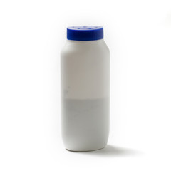 Body powder bottle on white background.