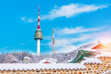 Landmark of Korea with covered Winter Snow n Seoul Tower , South korea