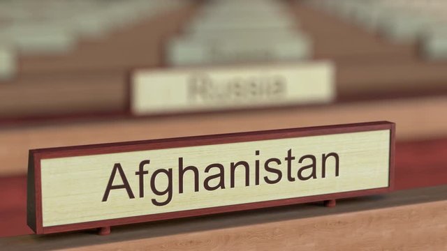 Afghanistan name sign among different countries plaques at international organization. 3D rendering