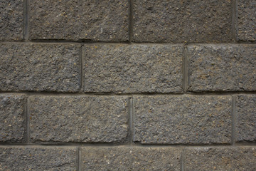 Grey brick wall texture.