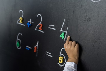 child studying numbers