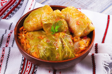 Cabbage rolls with meat, rice and vegetables. Stuffed cabbage leaves with meat. Dolma, sarma, sarmale, golubtsy or golabki - traditional and popular dish in many countries