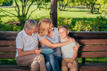 family with digital tablet