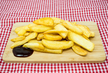 Golden French fries potatoes ready to be eaten