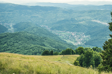 Slavic Romanian Est European landscape village between mountains