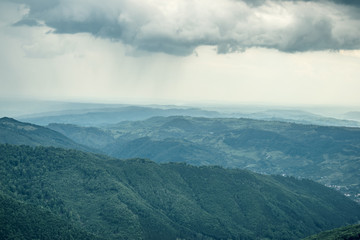 Slavic Romanian Est European landscape village between mountains