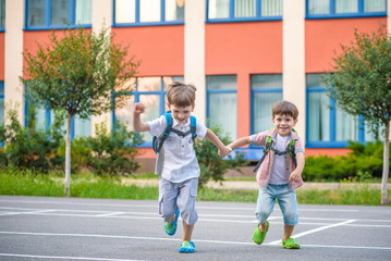 Young students, two sibling brothers, going to school. © pahis