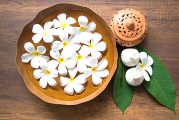 Obraz na płótnie Canvas Thai Spa massage compress balls, herbal ball and treatment spa, relax and healthy care with flower, Thailand. Healthy Concept. select focus.