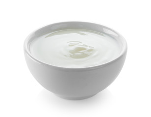 yogurt in white bowl on white background