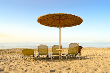 Sun loungers and umbrella