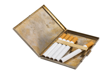 Metal vintage opened cigarette case with five cigarettes on isolated background.
