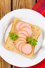 Whole wheat bread with sliced sausage