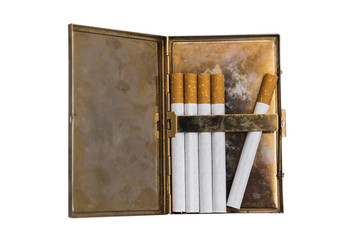 Metal vintage opened cigarette case with five cigarettes on isolated background.