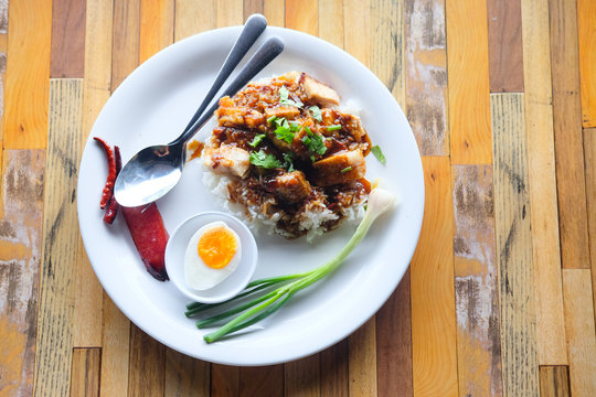 Crispy pork rice with egg on rice